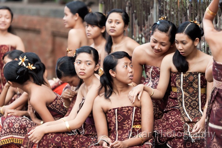 Tirta_Gangga_20100625_177.jpg - 29. GERINGSING GIRLS, TENGANAN - Young unmarried women of the Bali Aga village of Tenganan, dressed in the geringsing (double-ikat) cloth which is unique to this village. They later take turns to ride in pairs on a large wooden ferris wheel, signifying their eligibility for marriage.