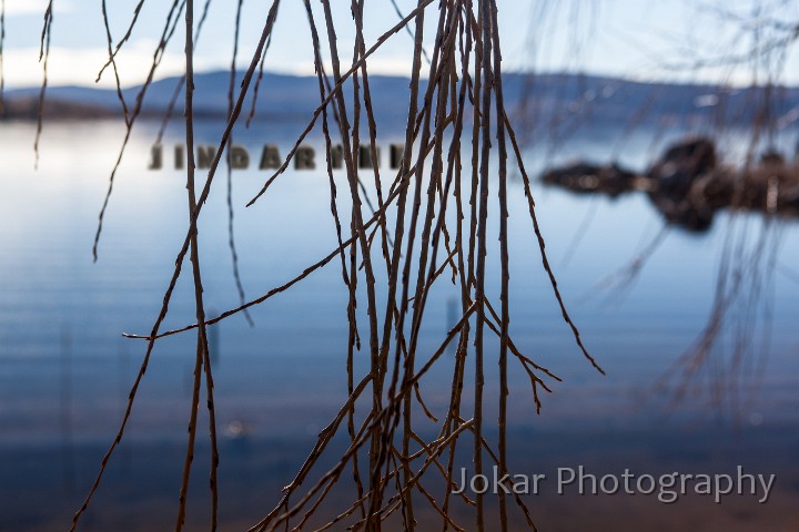 Jindabyne.jpg - Jindabyne.  The original town of Jindabyne was immersed when the Snowy River was dammed to create Lake Jindabyne, which was completed in 1967. The new town was established on the slopes above the southern end of the new lake, though some structures of the old town were not relocated, and remain submerged below the surface of the water. The base photograph looks north from the southern shore of the lake.